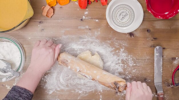 hands preparing dough on a kitchen counter