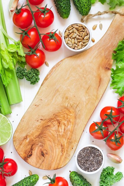 kitchen counter with cutting board and vegetables
